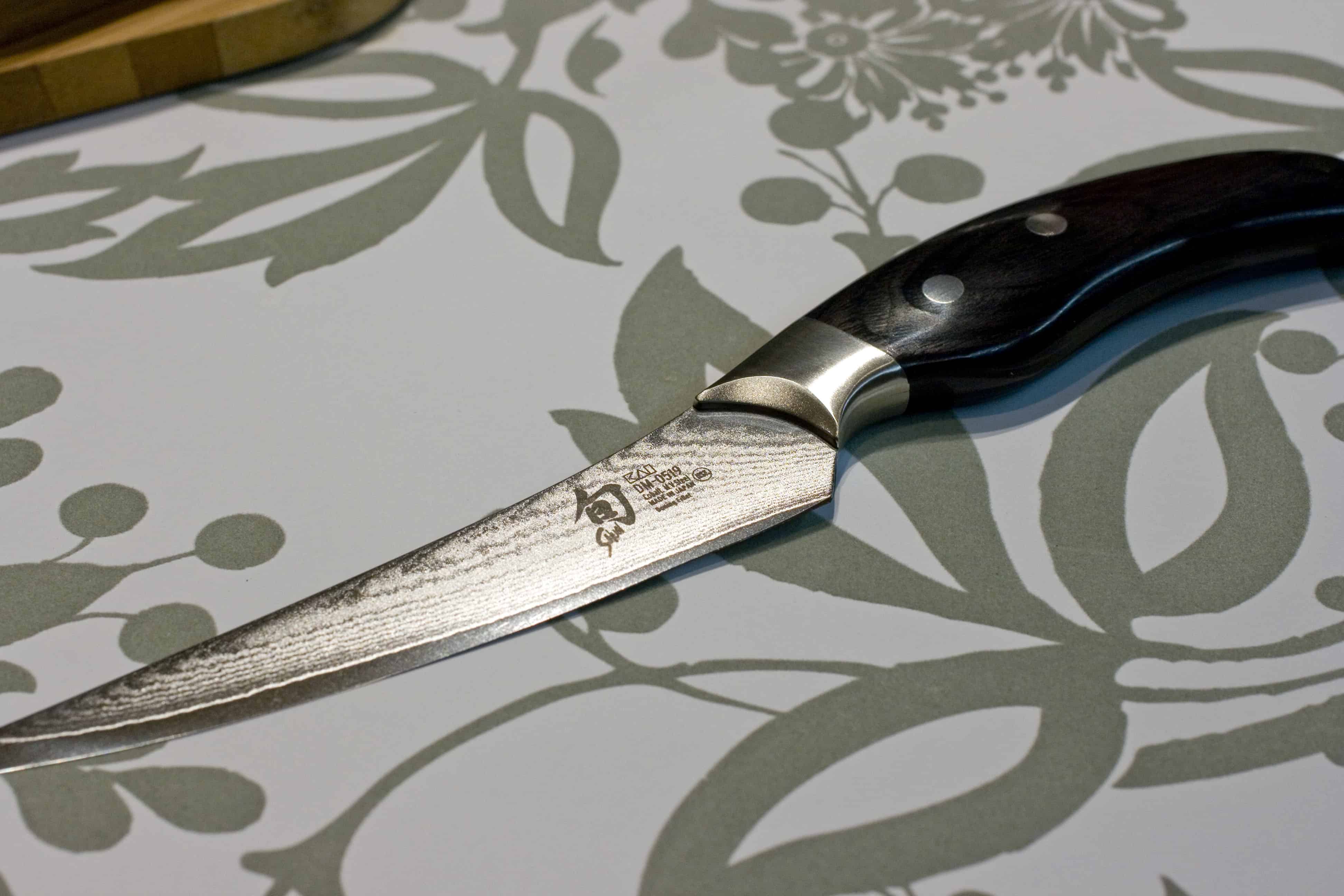 Boning knife on table