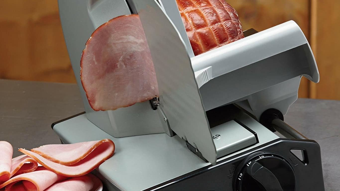 Slicing ham with a meat slicer